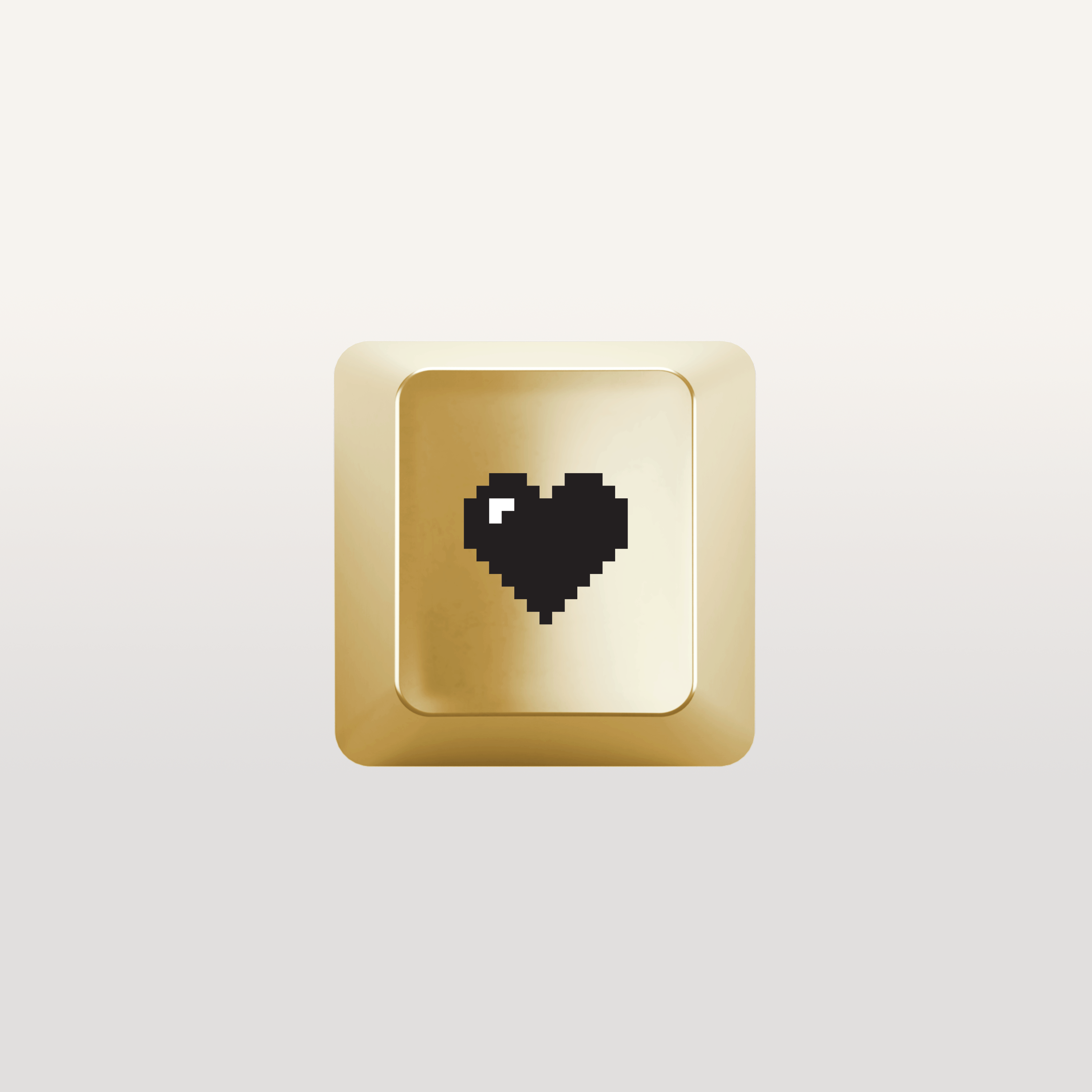 Keyboard key with book heart designed by Susan Kare, gold