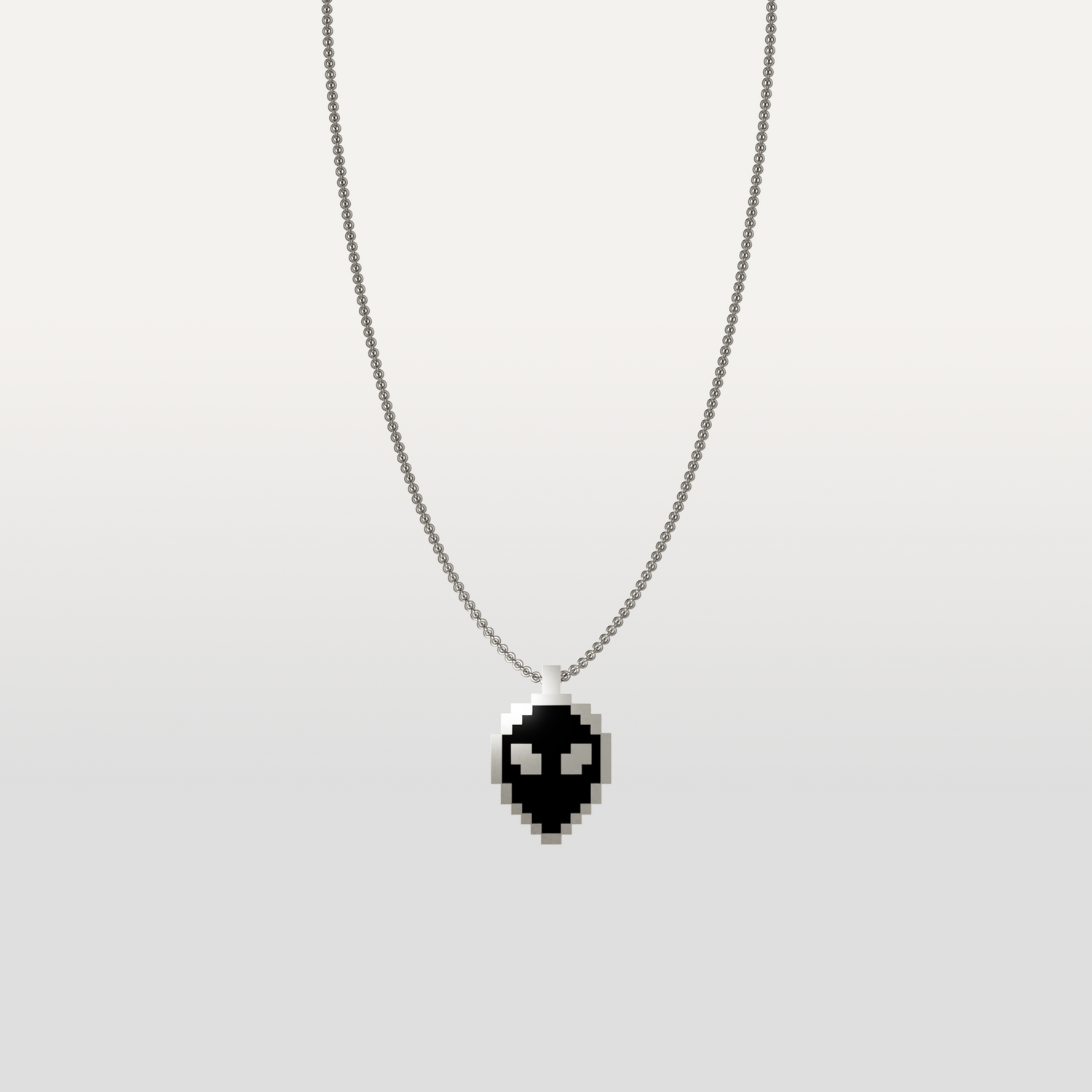 Alien necklace pendant in silver icon by Susan Kare