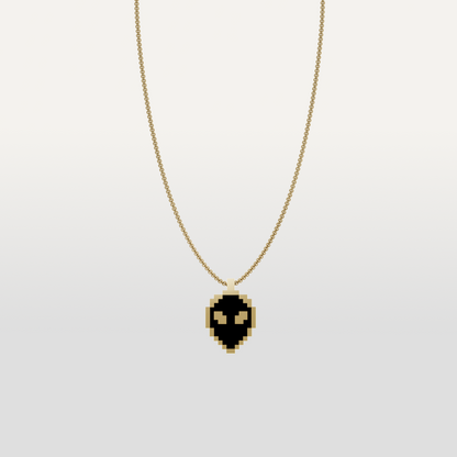 Alien necklace pendant in gold icon by Susan Kare