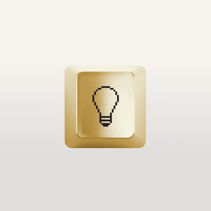 Key with lightbulb icon designed by Susan Kare in gold