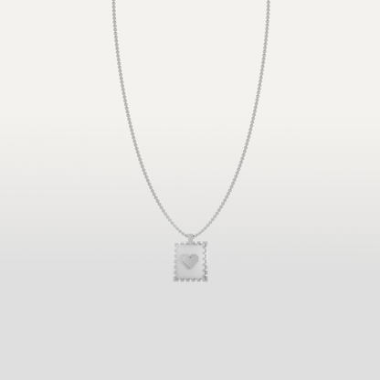 Love Stamp Necklace Pendant by Susan Kare in Silver - Elegant silver necklace with a heart stamp pendant designed by Susan Kare