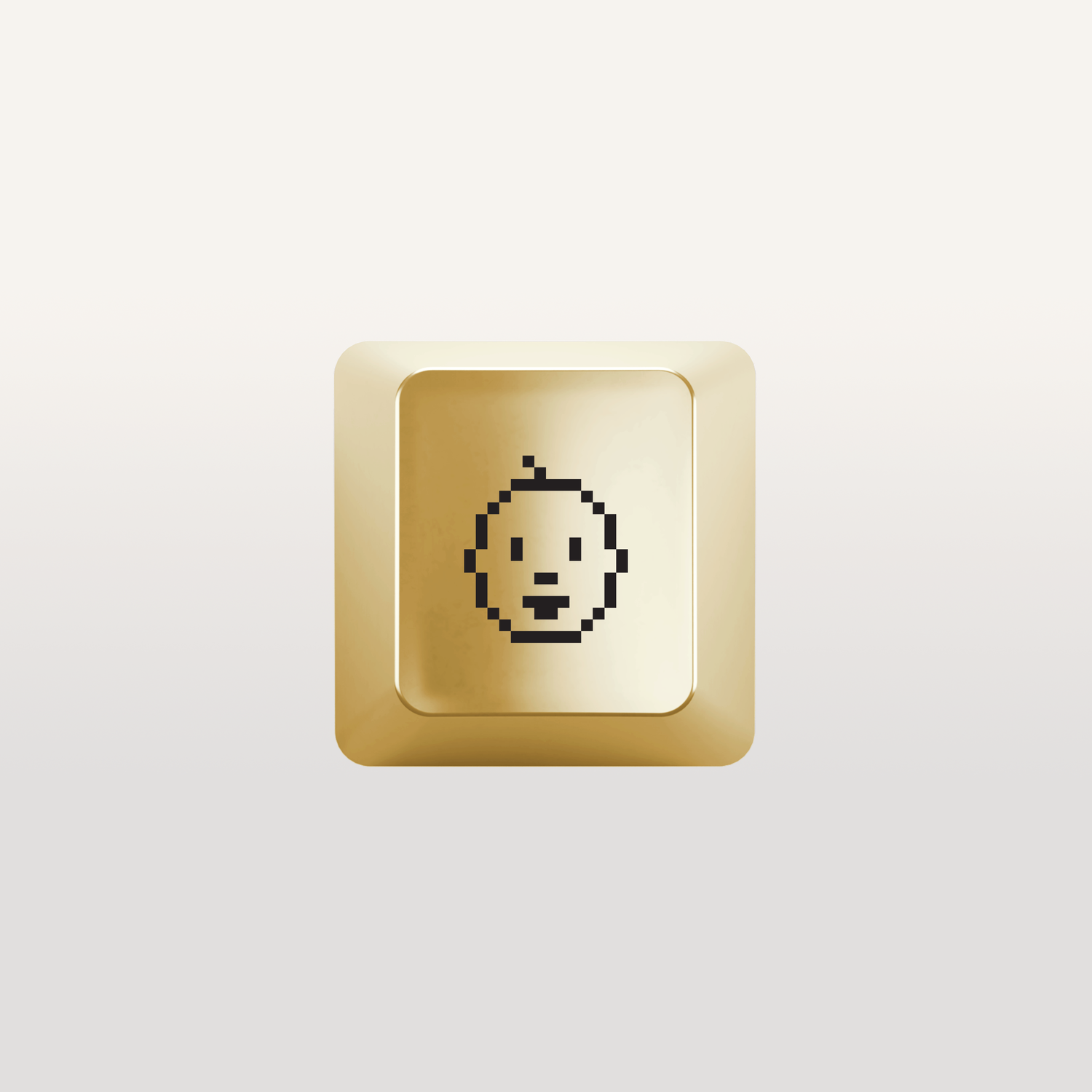 Child Icon Keychain by Susan Kare in Gold - Gold keychain featuring a child icon design by Susan Kare