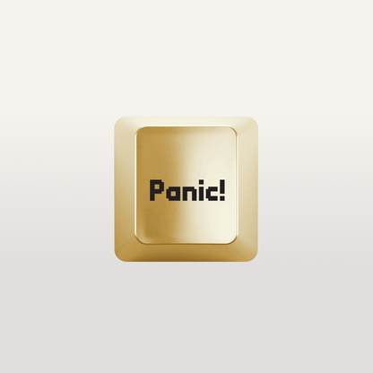 Panic button Key by Susan Kare in Gold - Gold keyboard key featuring a &quot;panic!&quot; icon design by Susan Kare